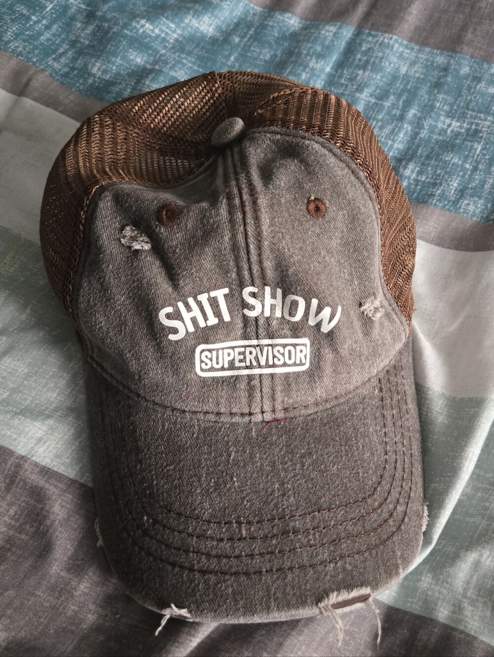 "Shit Show Supervisor" Distressed Trucker Hat - Brown